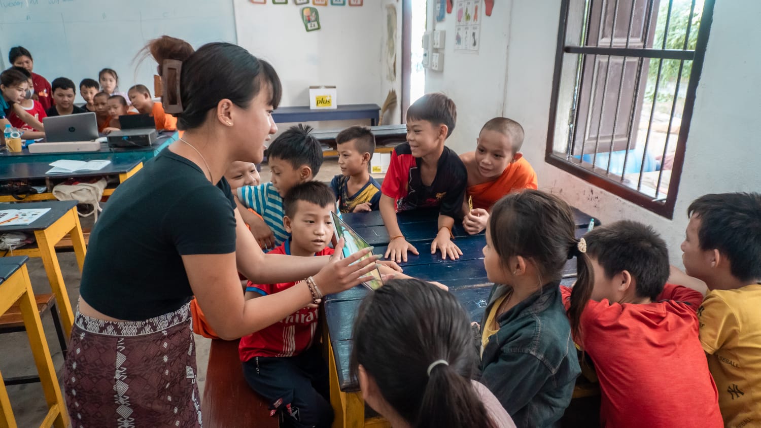 Happy students learning English